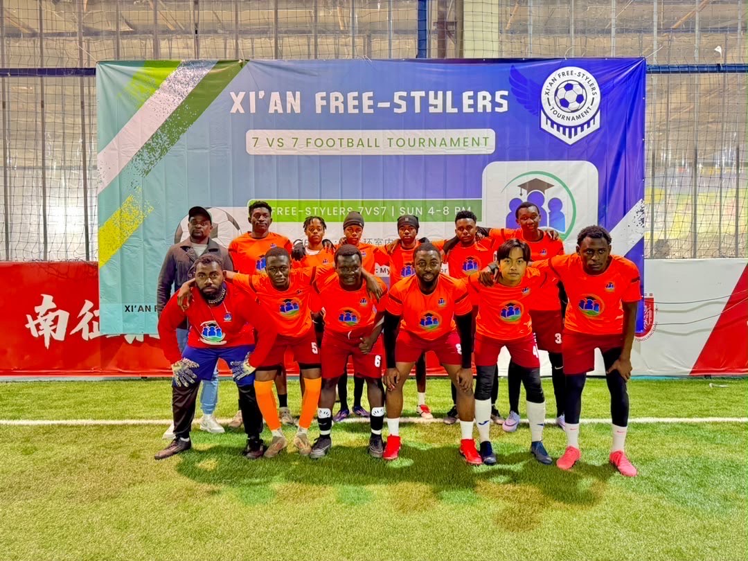 Team in orange MyDreamAdvisor kits at the Xi’an Free-Stylers 7 vs 7 football tournament